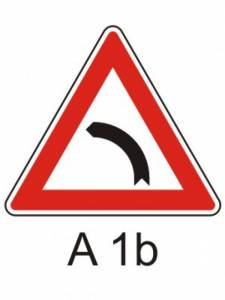 A1b - Zatáčka vlevo - výstražná dopravní značka